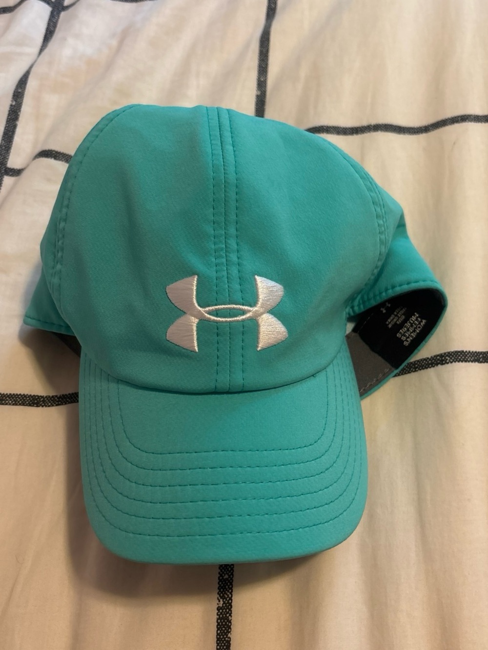 Under Armour Teal women’s Baseball Cap with White Logo